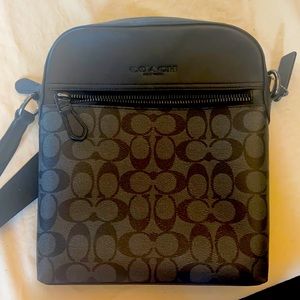 Black Coach crossbody bag.